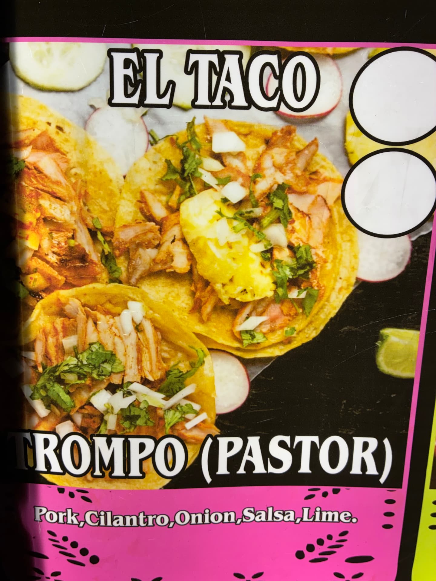 Trompo pastor tacos with cilantro, onion, salsa, and lime