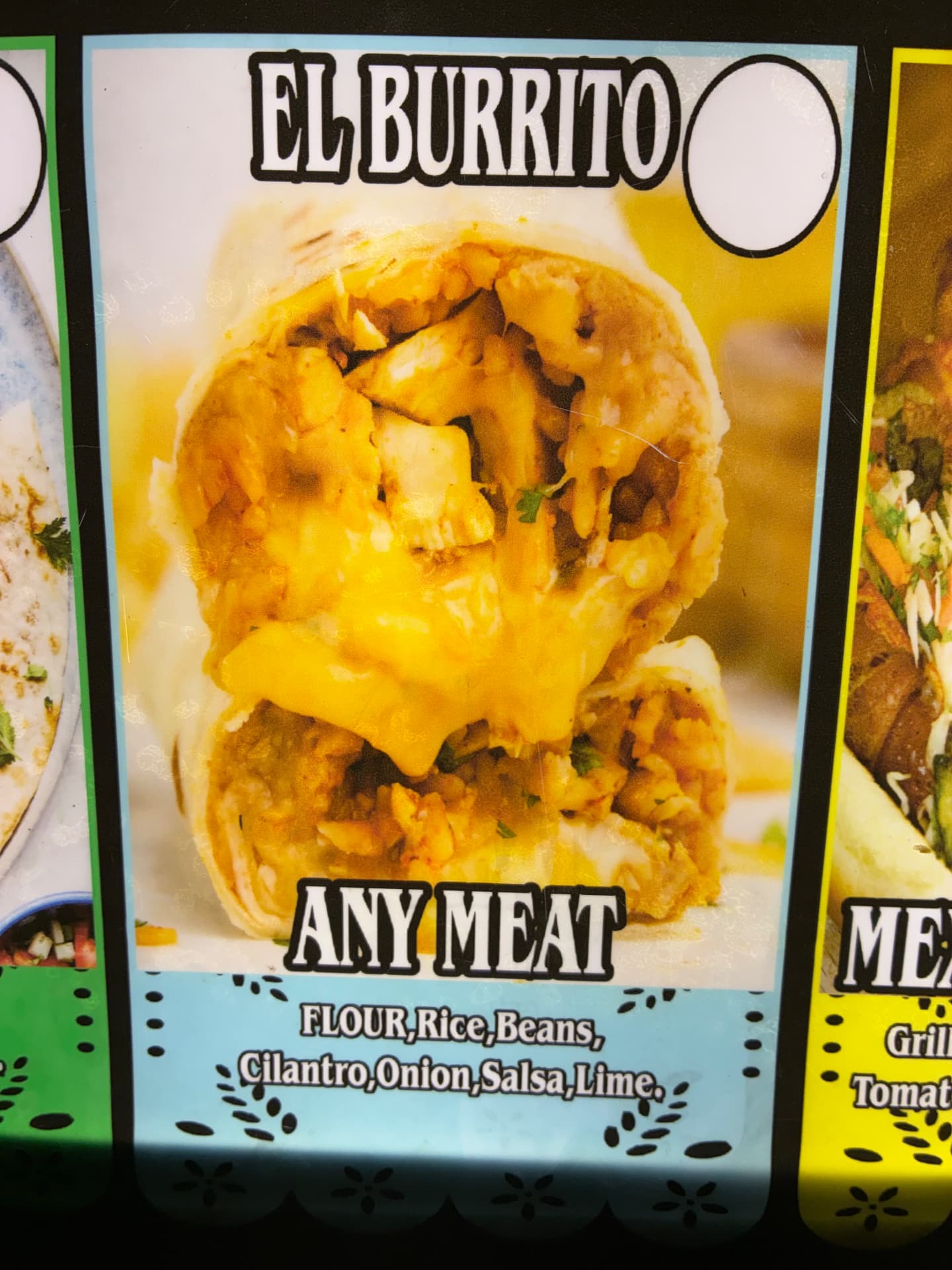 Cut burrito showing meat, rice, beans, and cheese